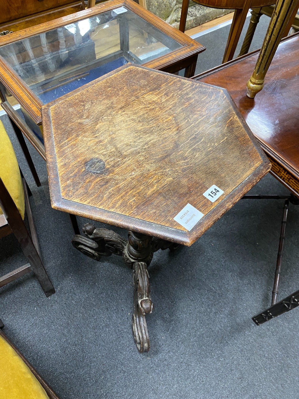 A Victorian hexagonal oak tripod occasional table, width 46cm, height 77cm